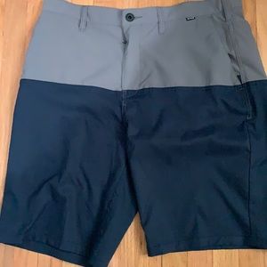 dark blue and light grey hurley shorts